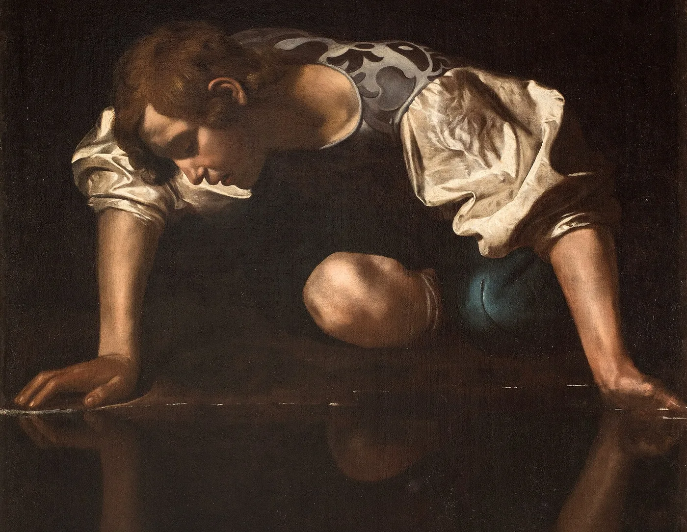 Caravaggio, Narciso. Um jovem hipnotizado pela própria imagem refletida na água.